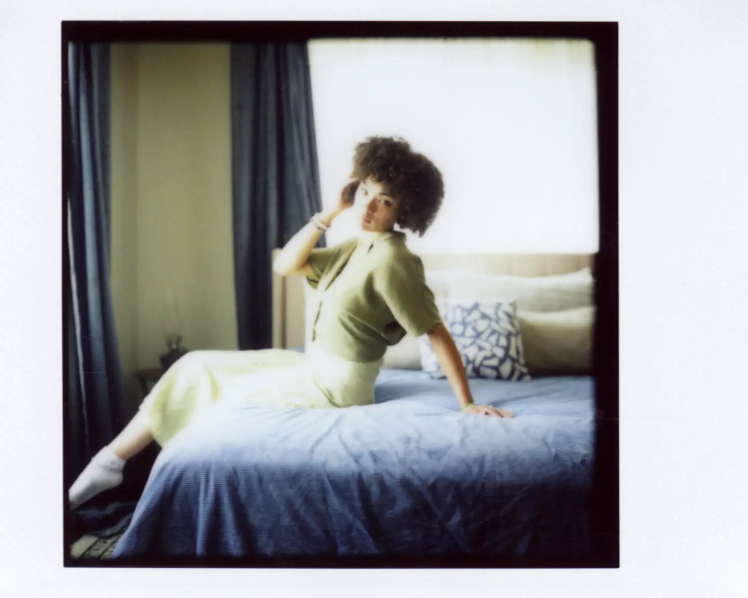 Indoor portrait surrounded by soft room light