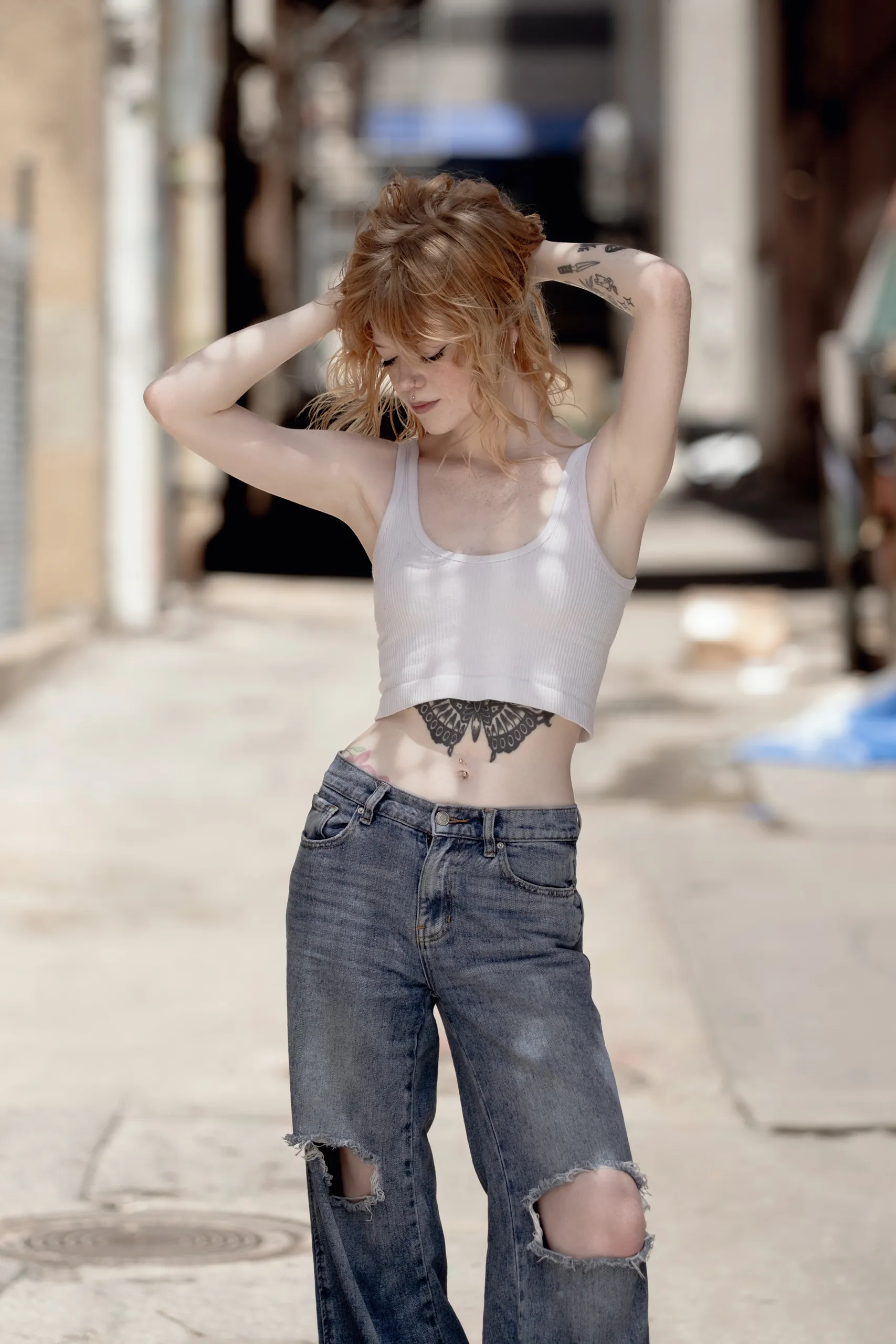 Full-length portrait held against a geometric city setting